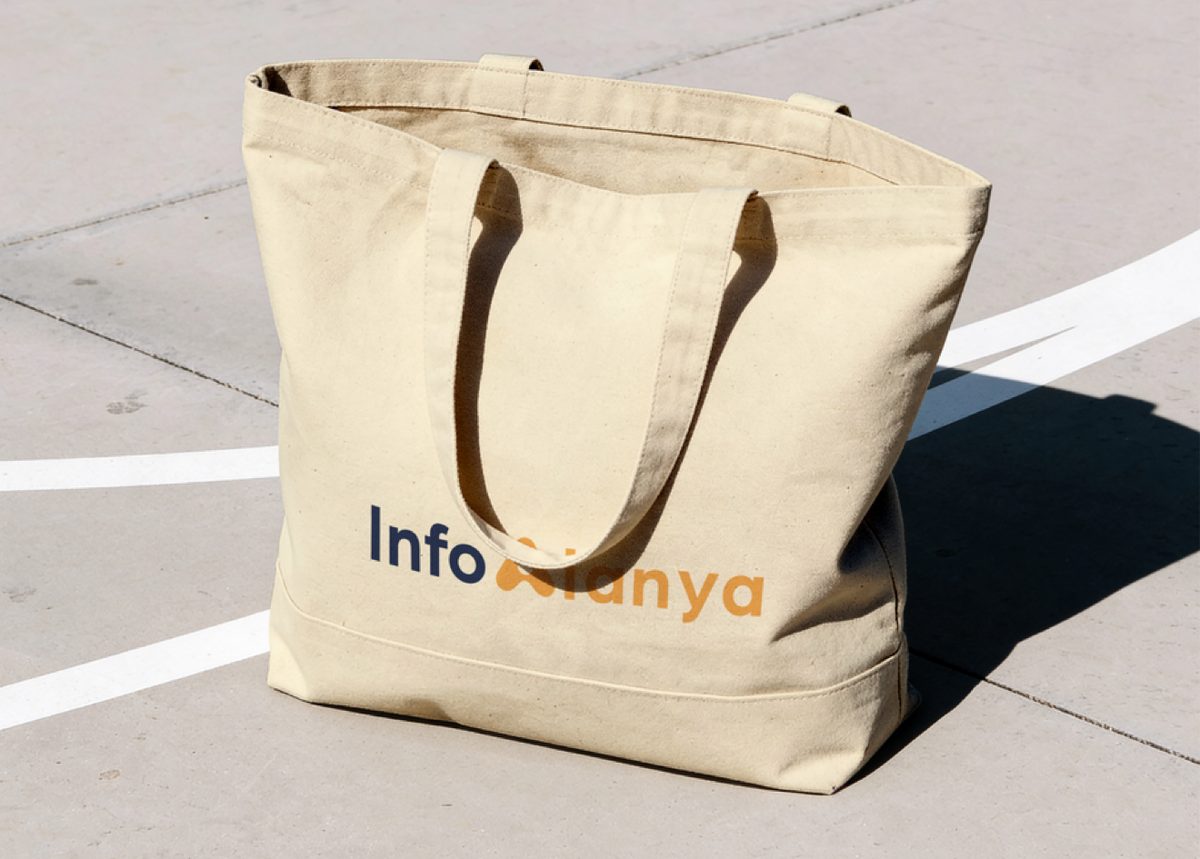 InfoAlanya logo on a tote bag